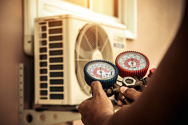 Professional Ac Installation technician working in Newton Lower Falls, MA